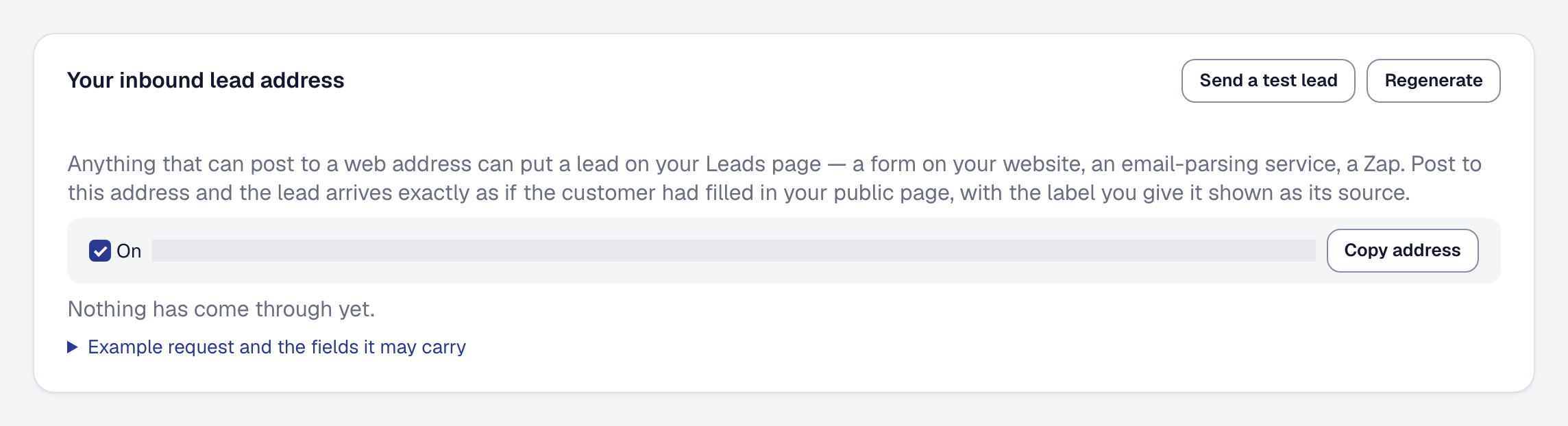 The inbound lead address on its own page, switched on, its secret painted over, with Send a test lead, Regenerate and Copy address, and nothing come through yet